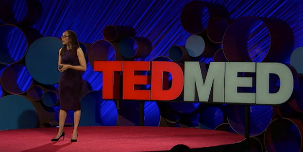 Sociologist Dorothy Roberts in front of a TEDMed signage during her presentation